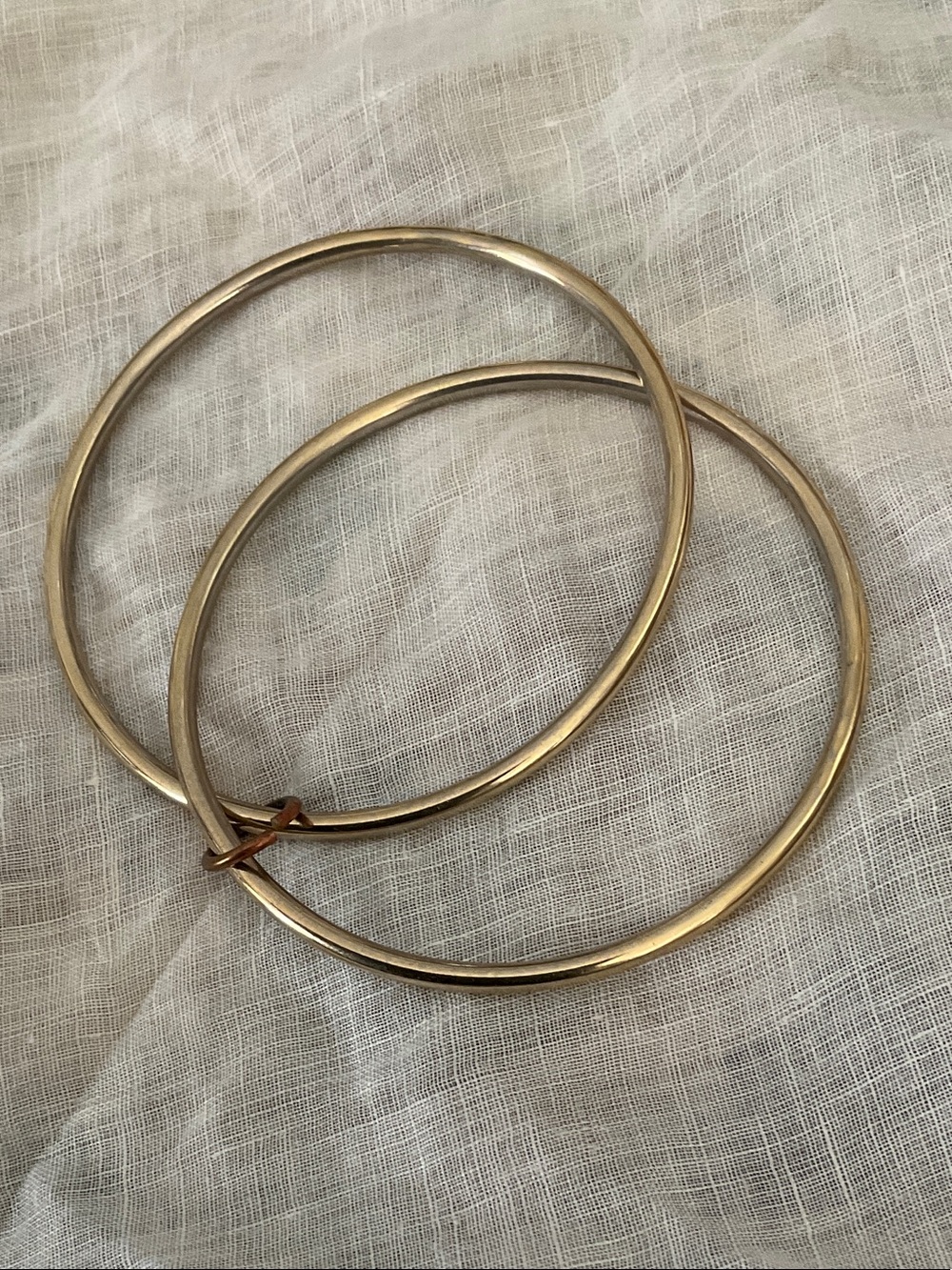VANTAGE, THIN GOLD PLATED BANGLES ATTACHED BY SMALL RING- OS.